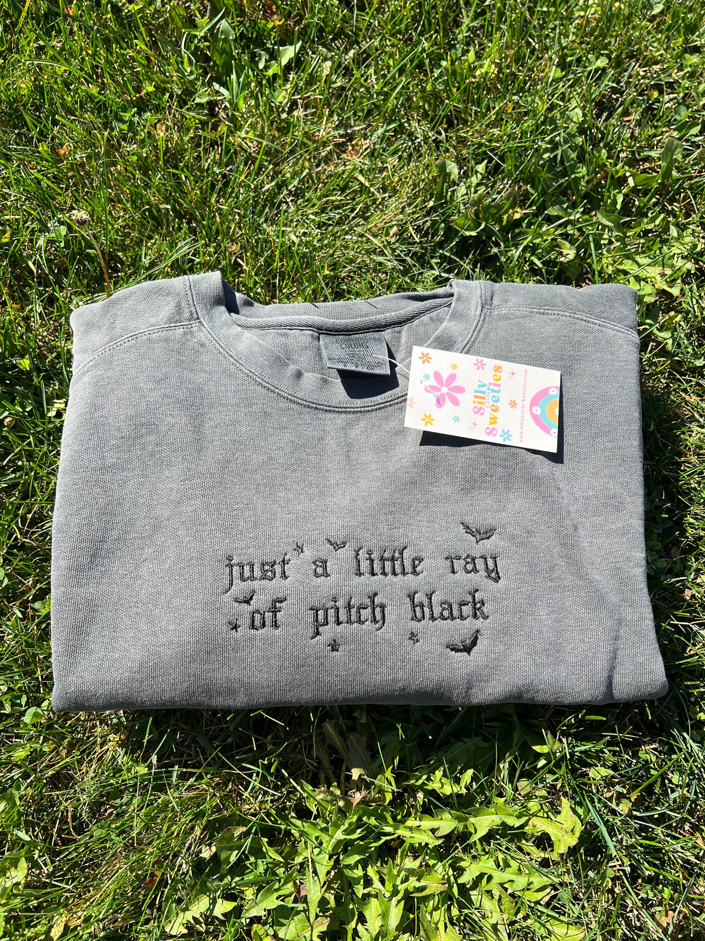 Just a Little Ray of Pitch Black Sweater Embroidered